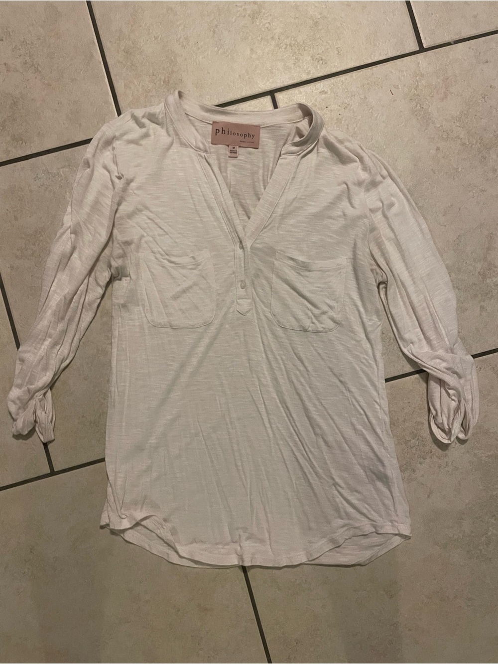 Philosophy light cream V-neck tunic top
